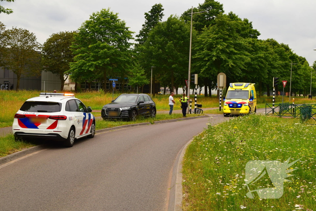 Botsing driewielfiets en auto