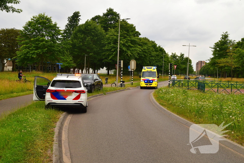 Botsing driewielfiets en auto