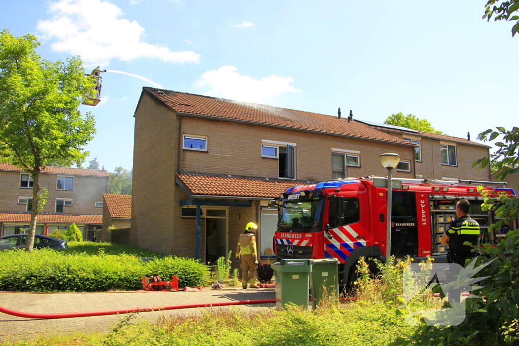 Grote uitslaande brand in woning