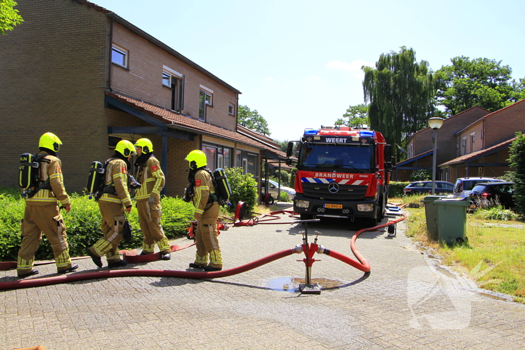Grote uitslaande brand in woning