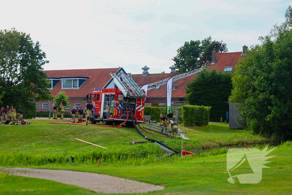 Zeer grote brand op golfbaan