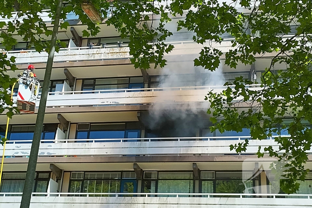 Bewoners ontkomen aan brand
