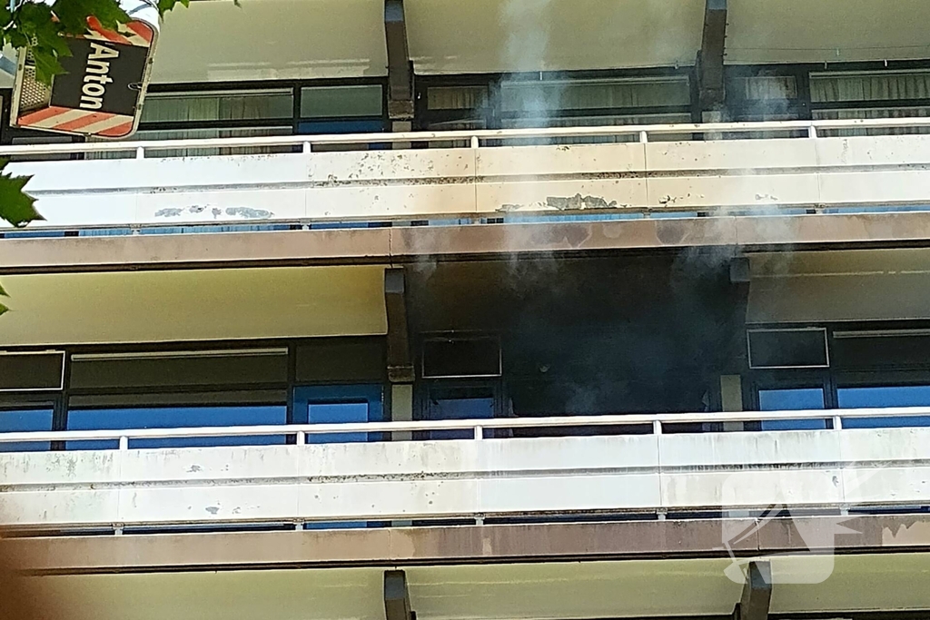 Bewoners ontkomen aan brand