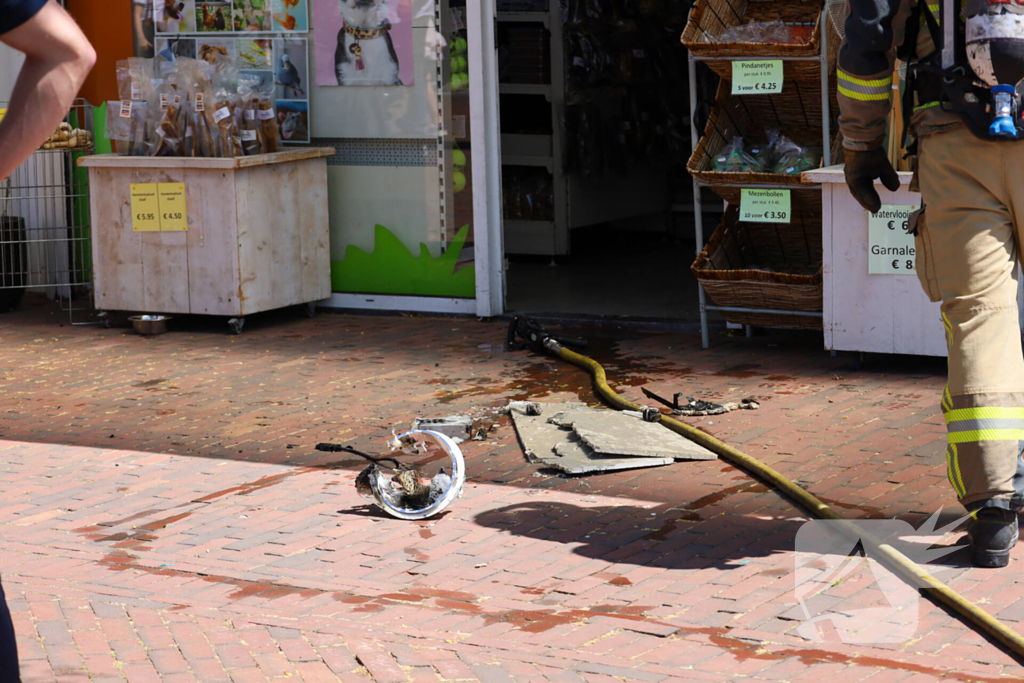 Brand in dierenwinkel snel geblust