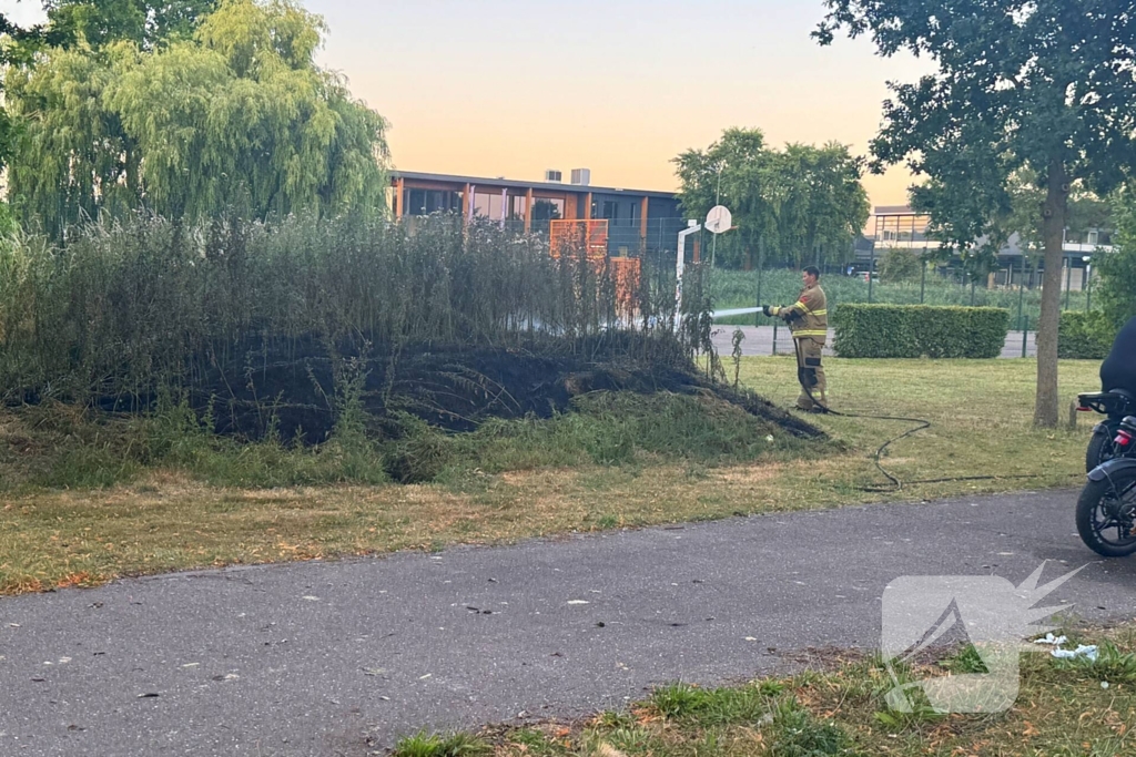 Brandweer blust bermbrand