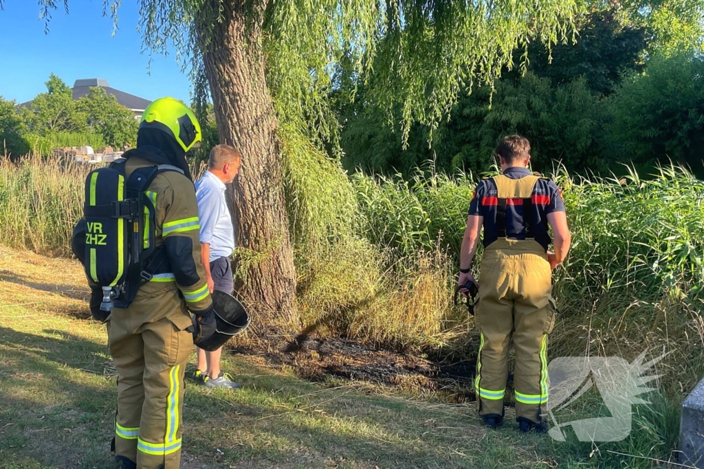 Vlammen gedoofd door buurtbewoners