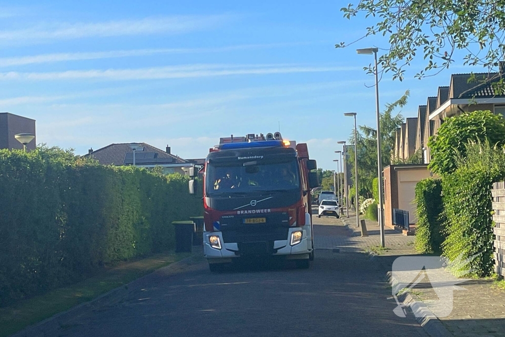 Vlammen gedoofd door buurtbewoners