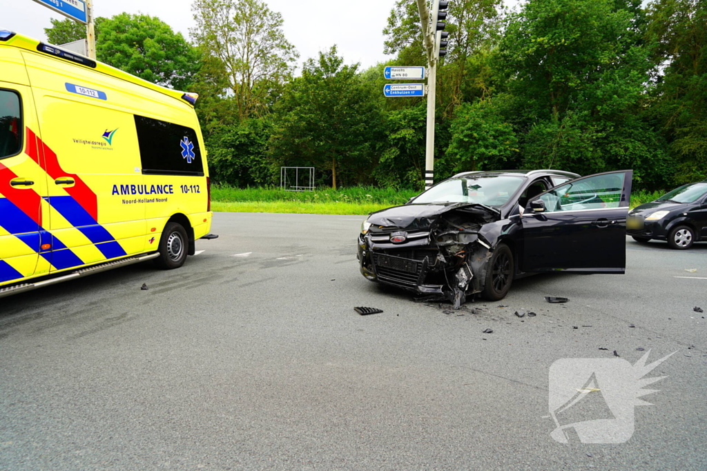 Botsing met blikschade op drukke kruising