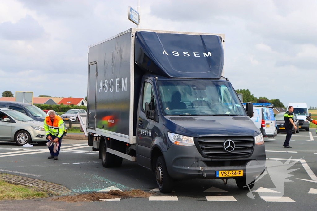 Bakwagen met schoenen gekanteld