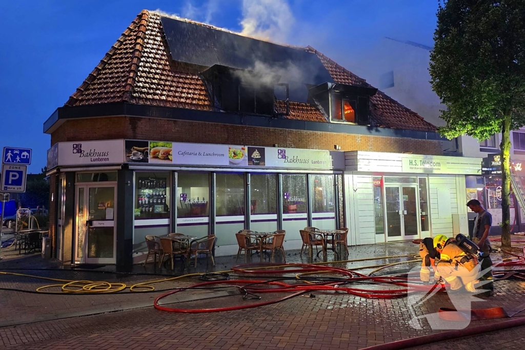 Gewonde en aanhouding bij grote woningbrand