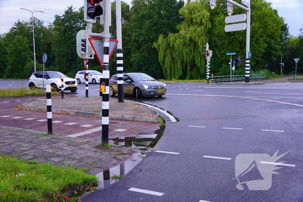 Auto klapt op verkeerslicht