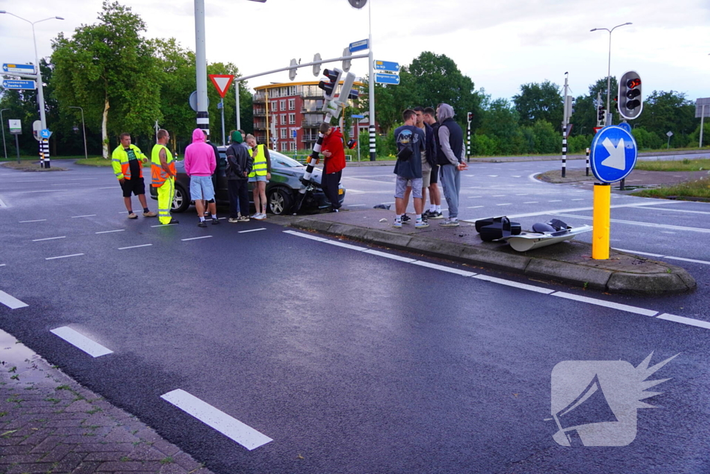 Auto klapt op verkeerslicht
