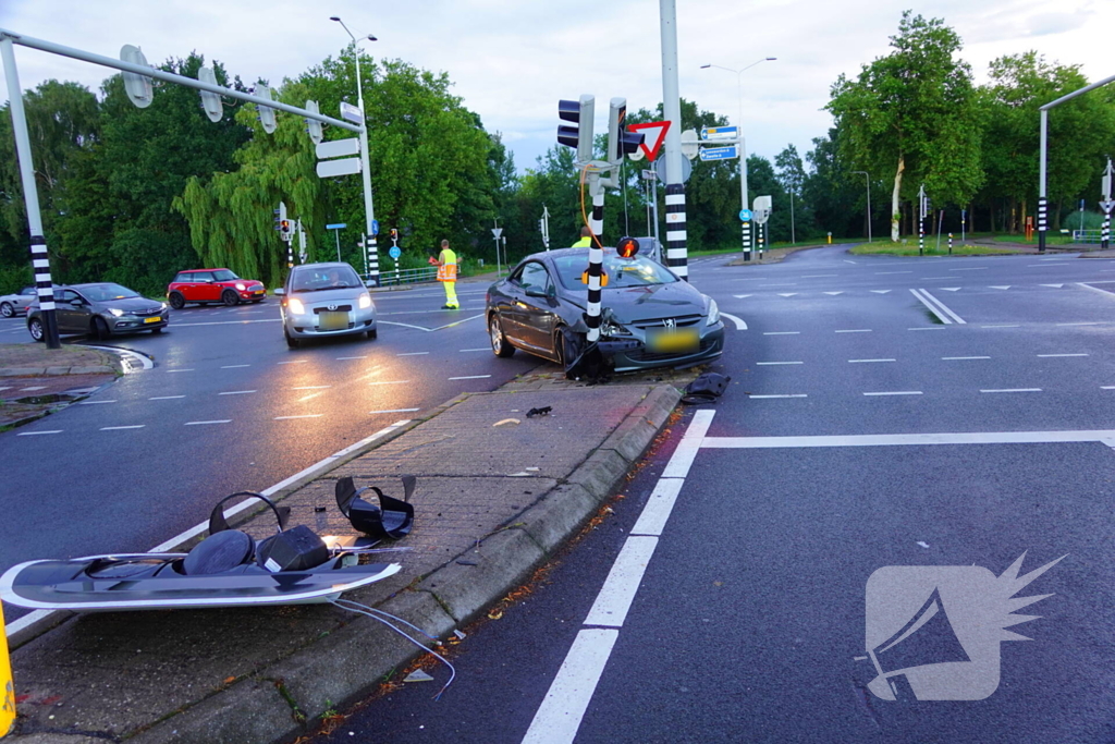 Auto klapt op verkeerslicht