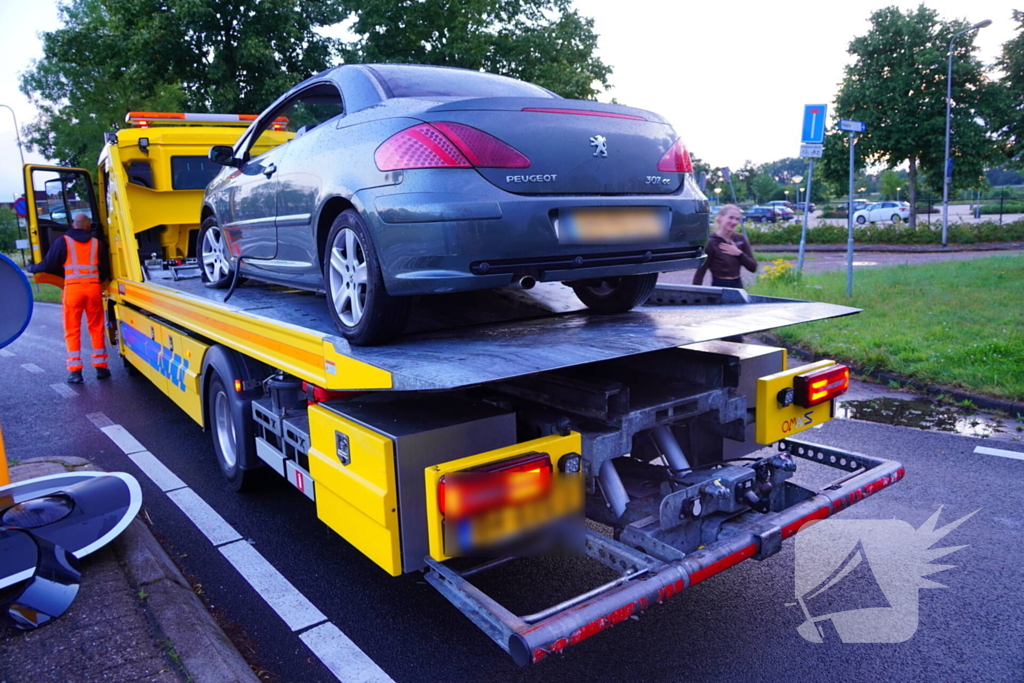 Auto klapt op verkeerslicht