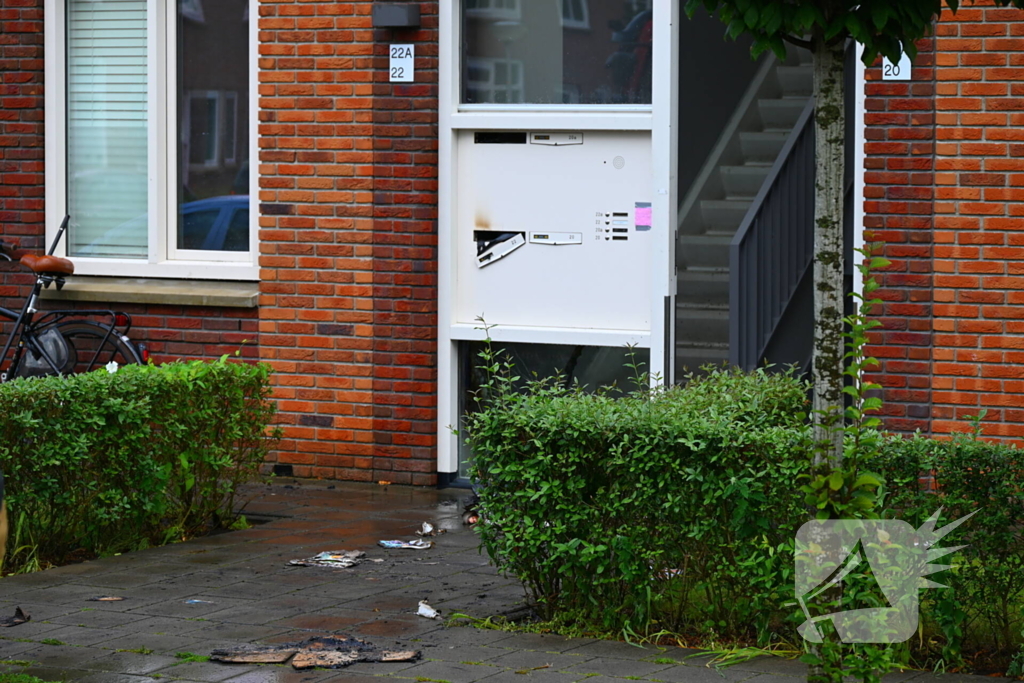 Brand in brievenbus portiekflat