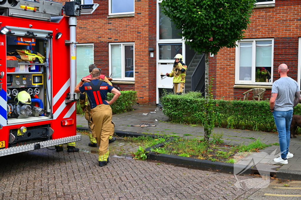 Brand in brievenbus portiekflat