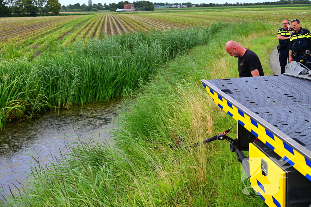 Motor belandt in het water