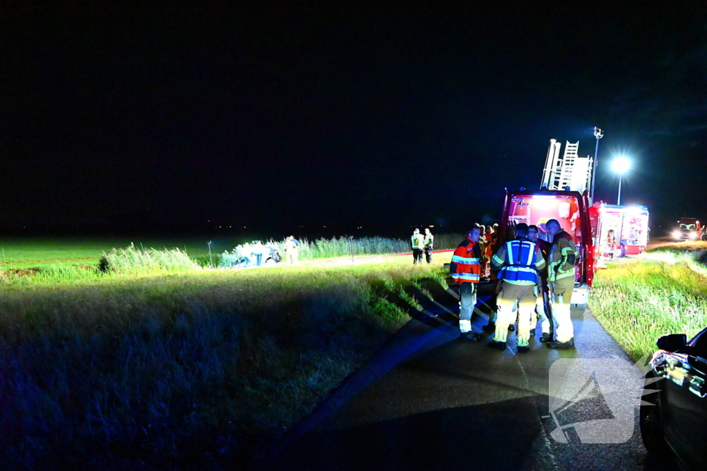 Voertuig te water, bestuurder gewond meegenomen