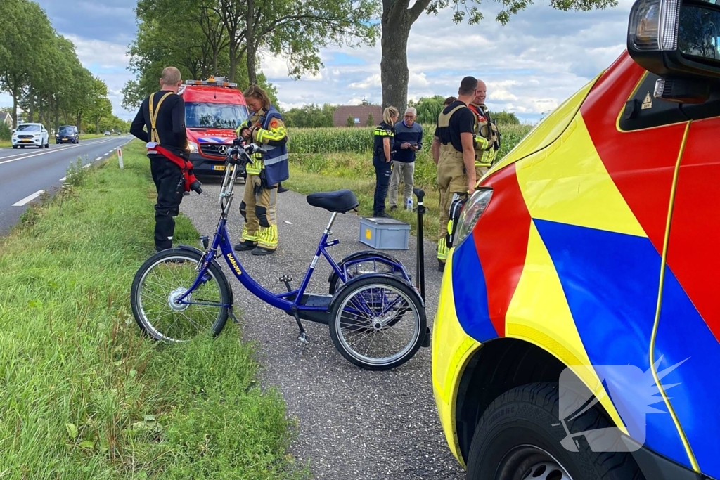 Driewielerbestuurder raakt te water