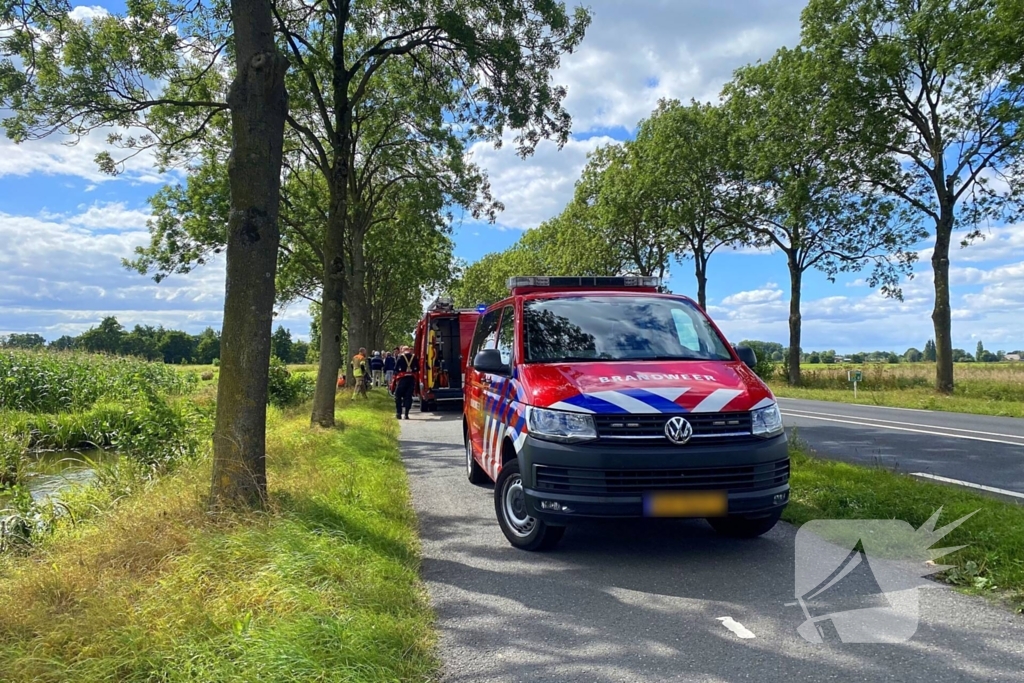 Driewielerbestuurder raakt te water