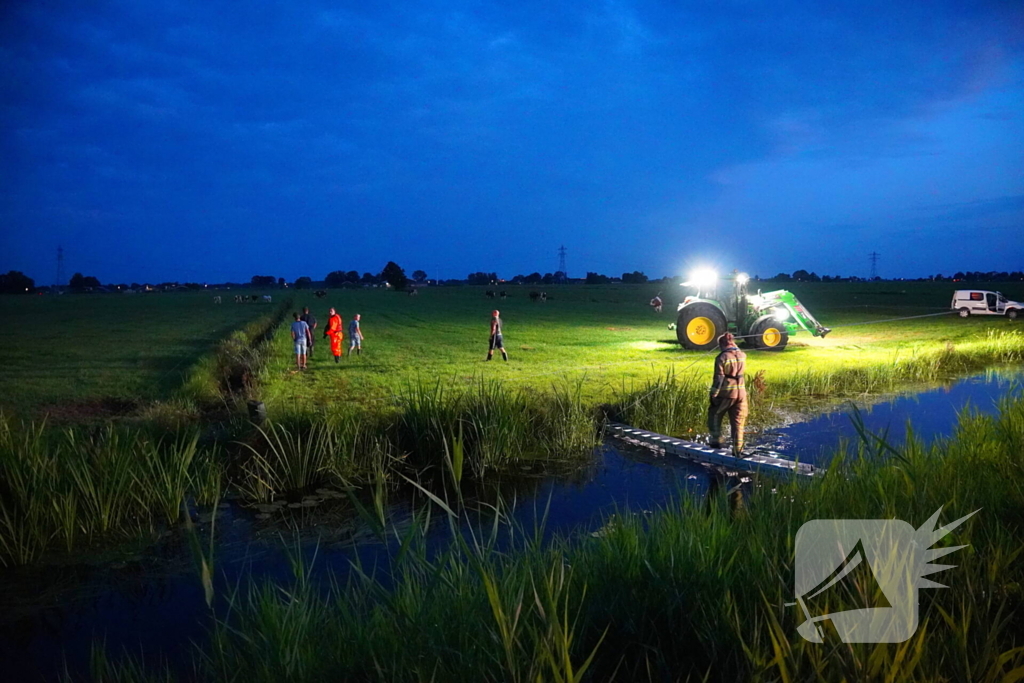 Reddingsactie door brandweer en boer