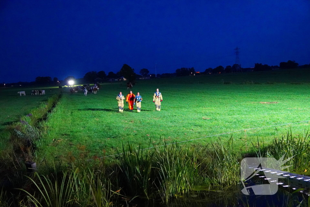 Reddingsactie door brandweer en boer