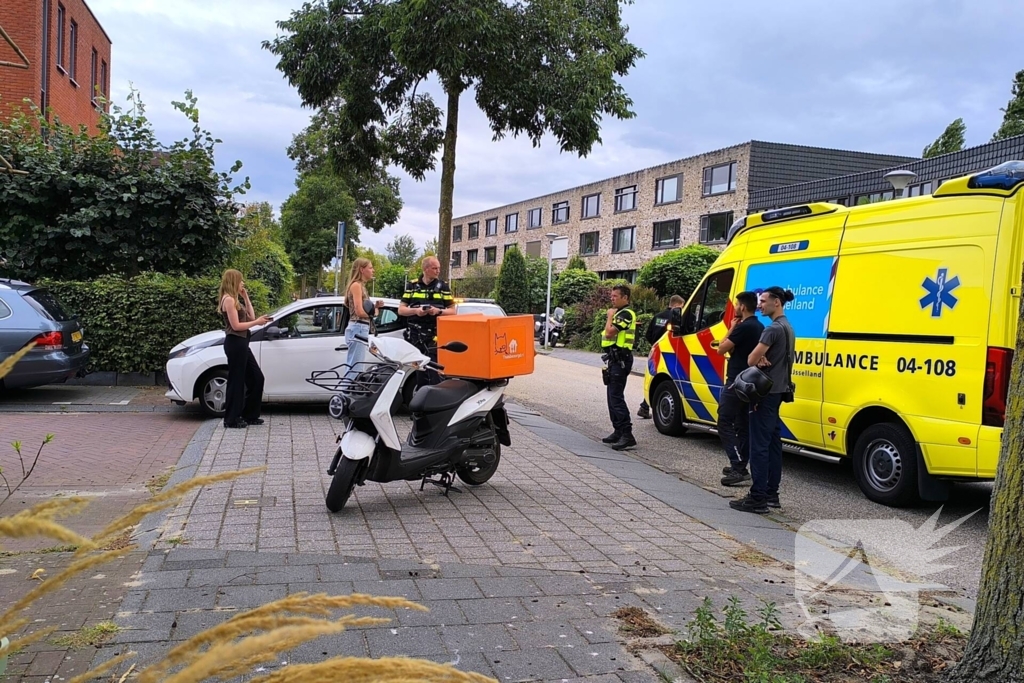 Politie en ambulance na botsing
