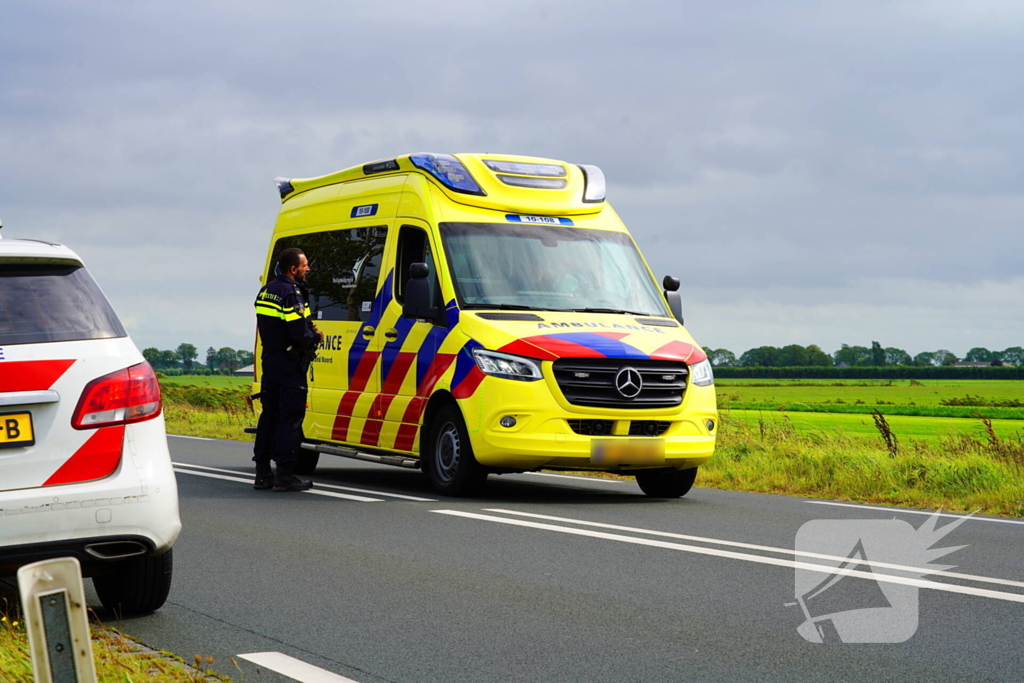 Verkeersongeval met auto in water
