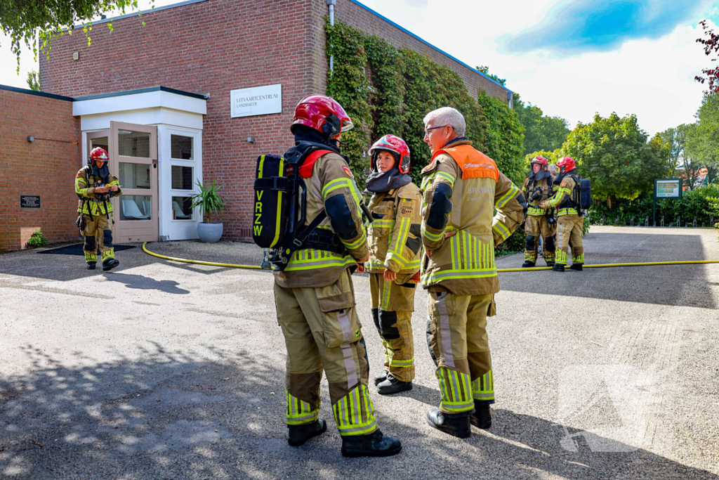 Brand in aula begraafplaats geblust