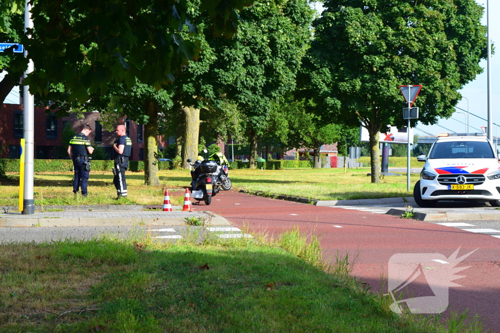 Scooterrijder in botsing op rotonde