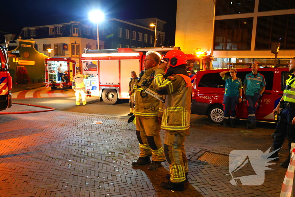 Grote brand boven winkels