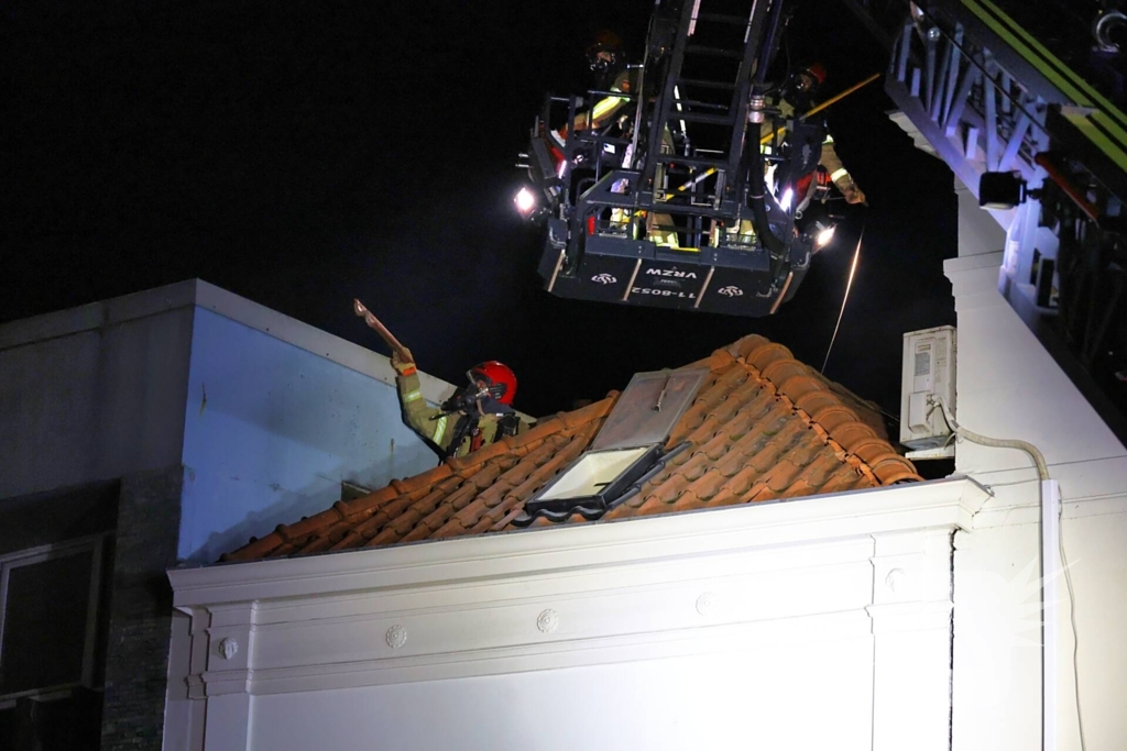 Grote brand boven winkels