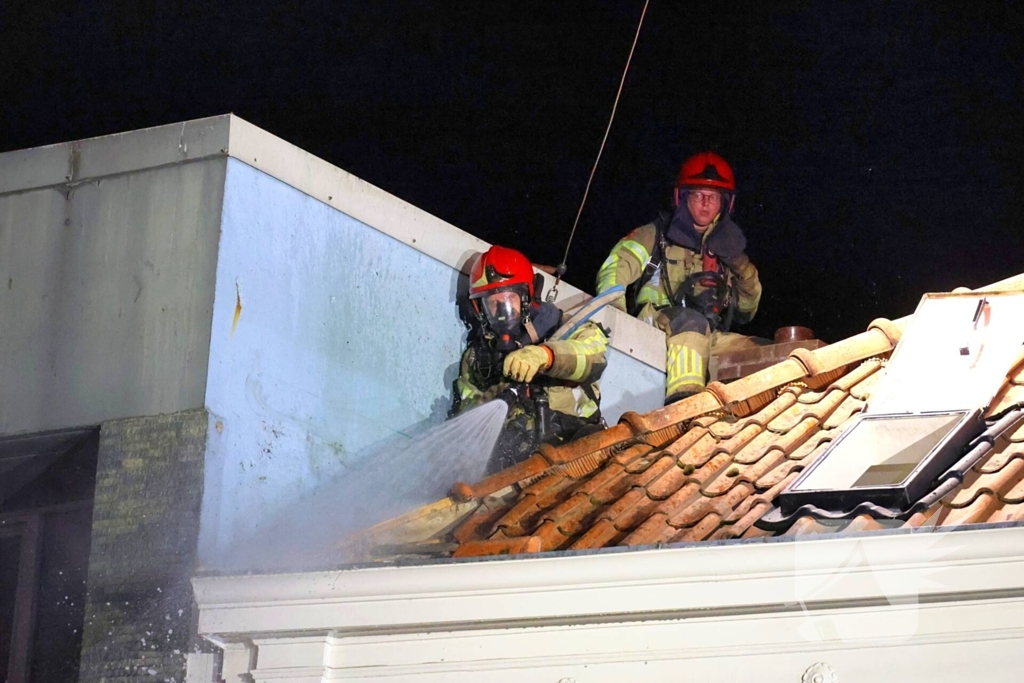 Grote brand boven winkels