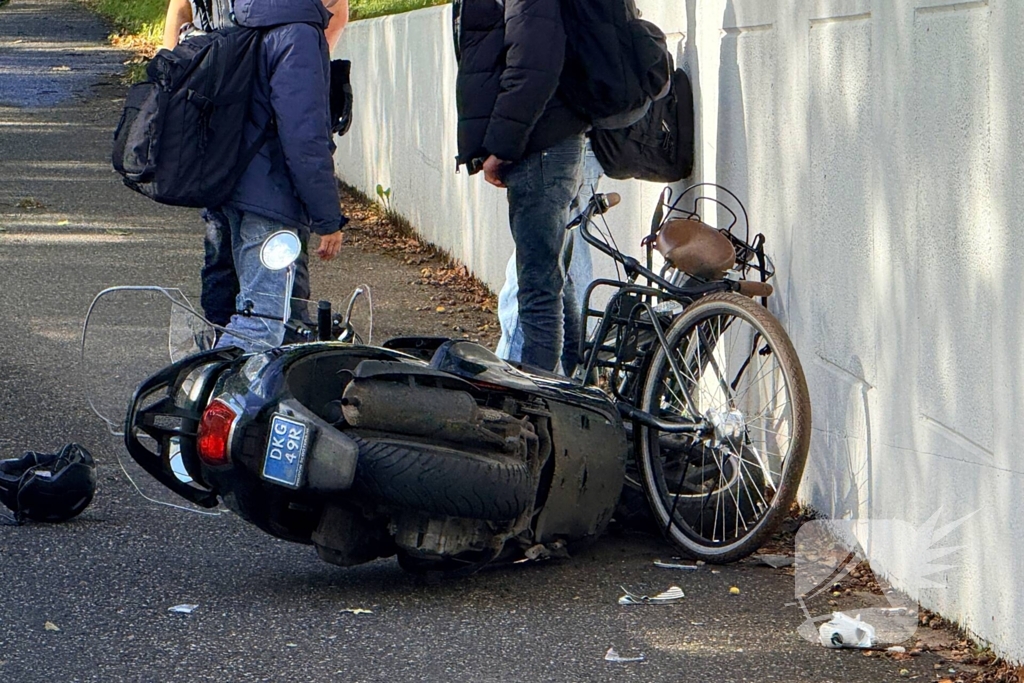 Scooter en fietser botsen in ongeval