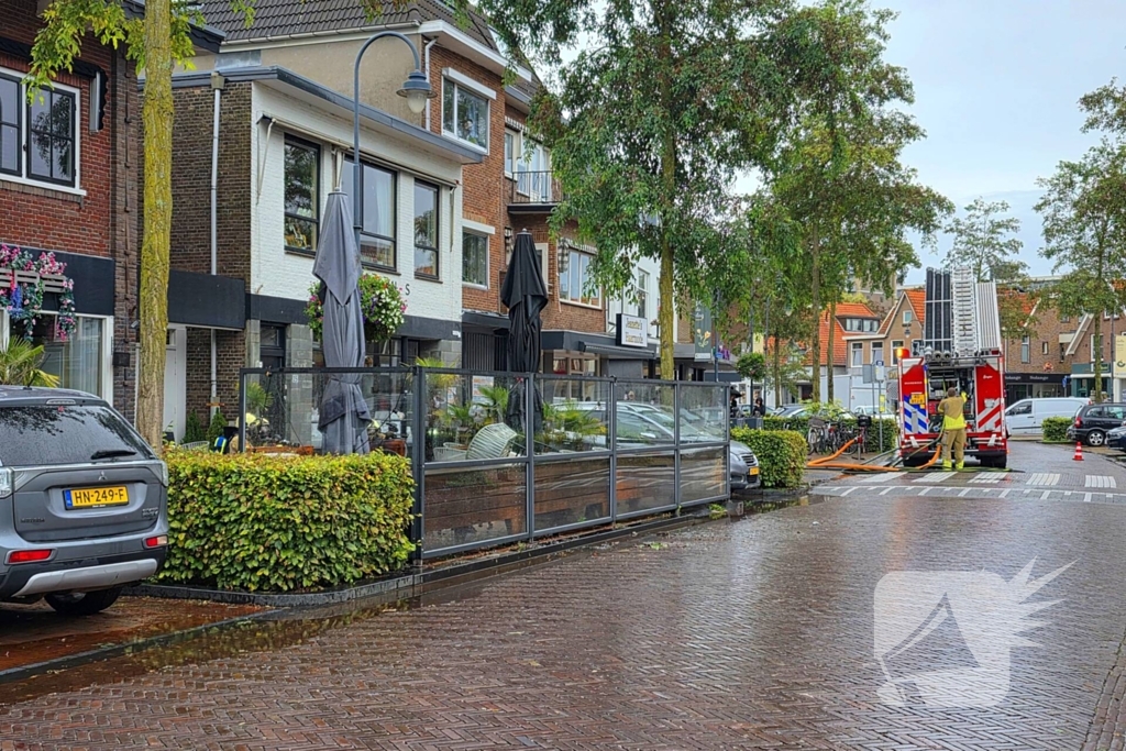 Brand op terras van restaurant geblust