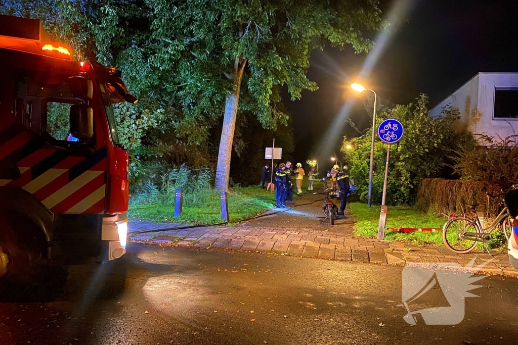 Scooterbrand in de nacht