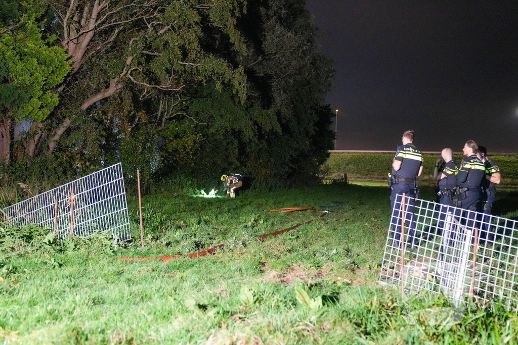 Woningbrand met veel bomen