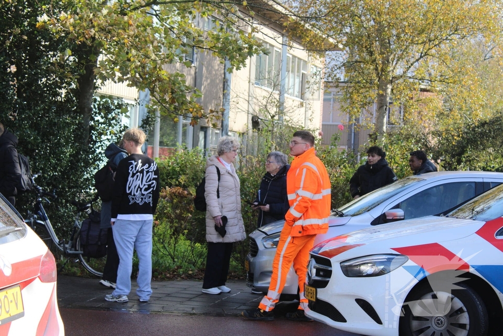 Twee voertuigen raken elkaar bij splitsing