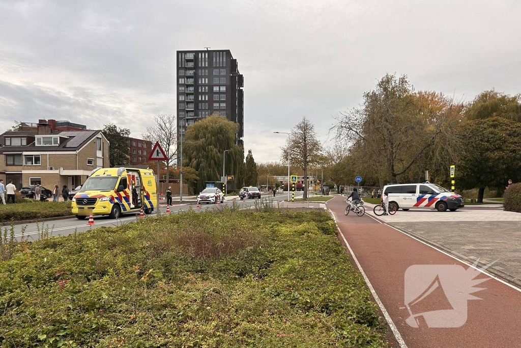 Motorrijder en fietser met elkaar in botsing