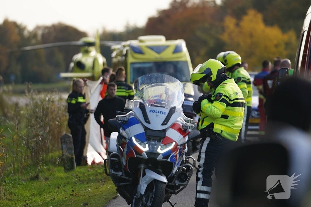 Fietser te water in ernstige situatie
