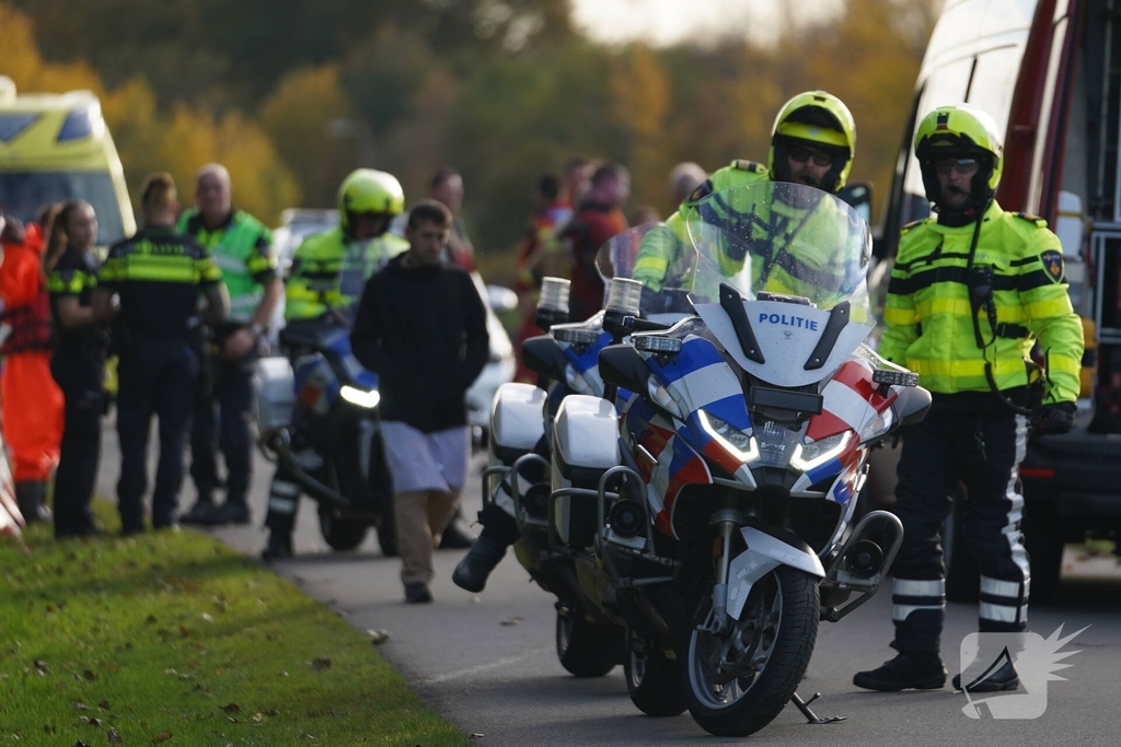 Fietser te water in ernstige situatie