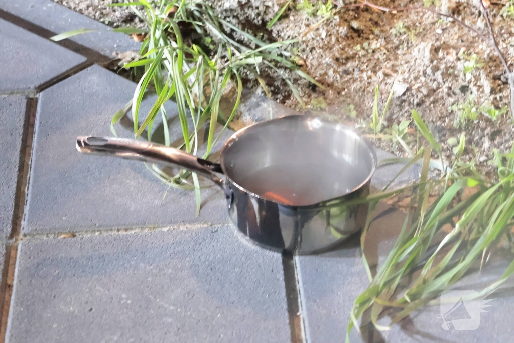 woningbrand door vlam in pan