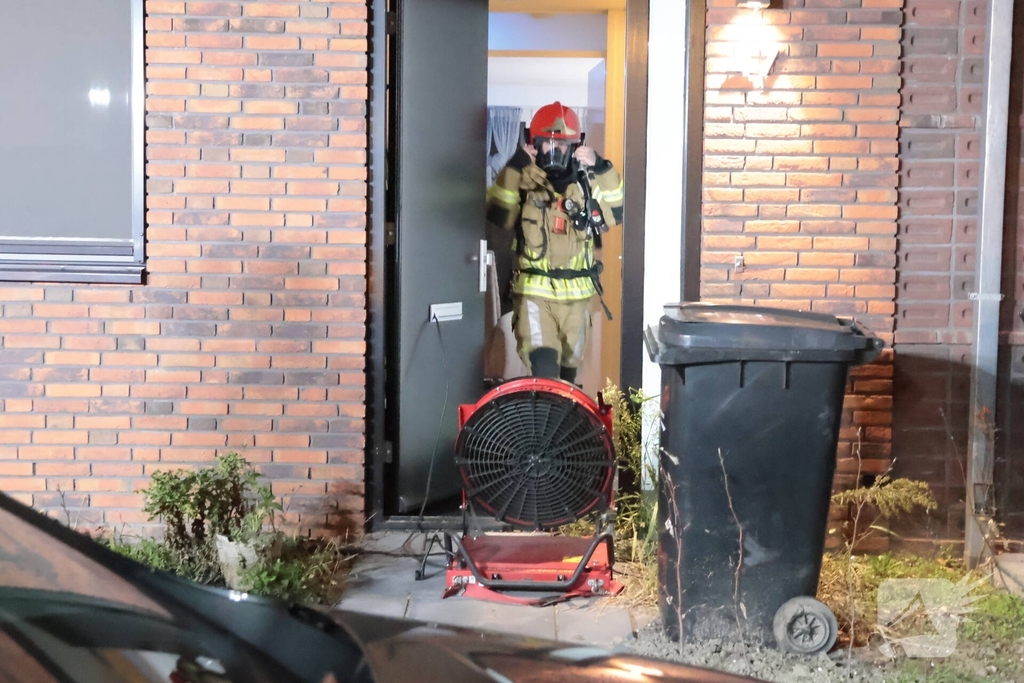 woningbrand door vlam in pan