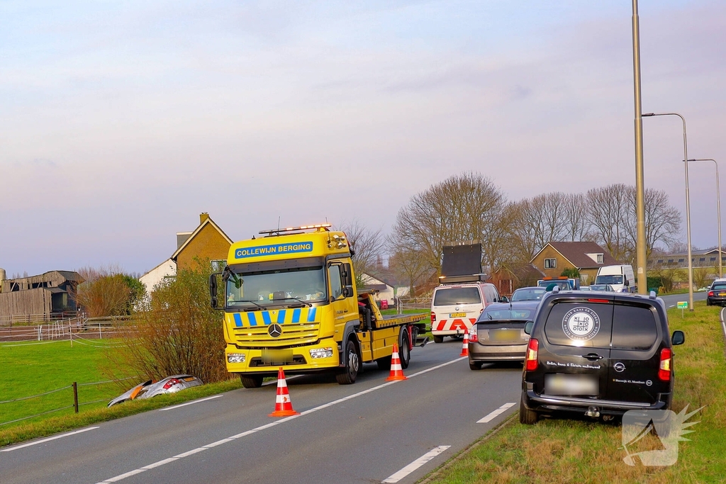 Auto te water in ongeval