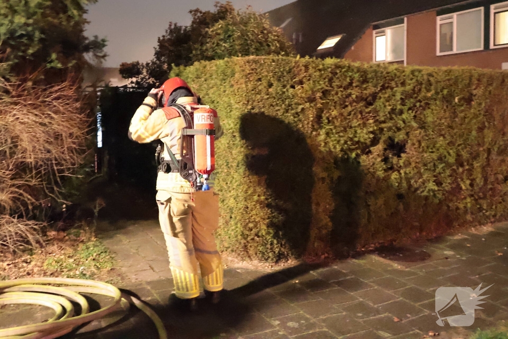 Forse brand in achtertuin woning