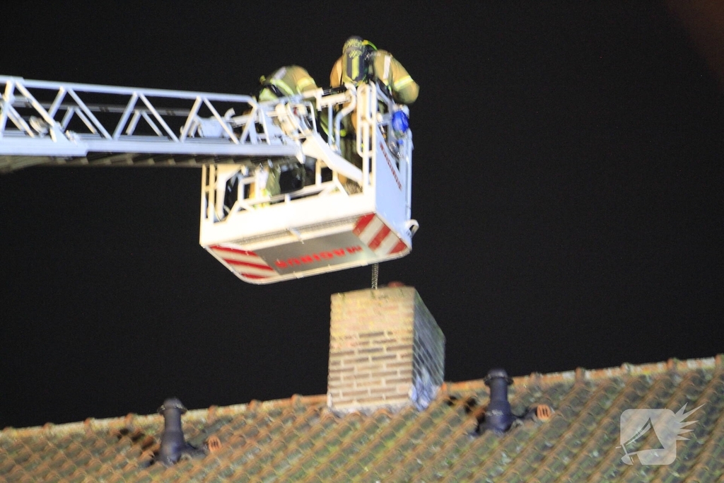 Schoorsteenbrand geblust in woning