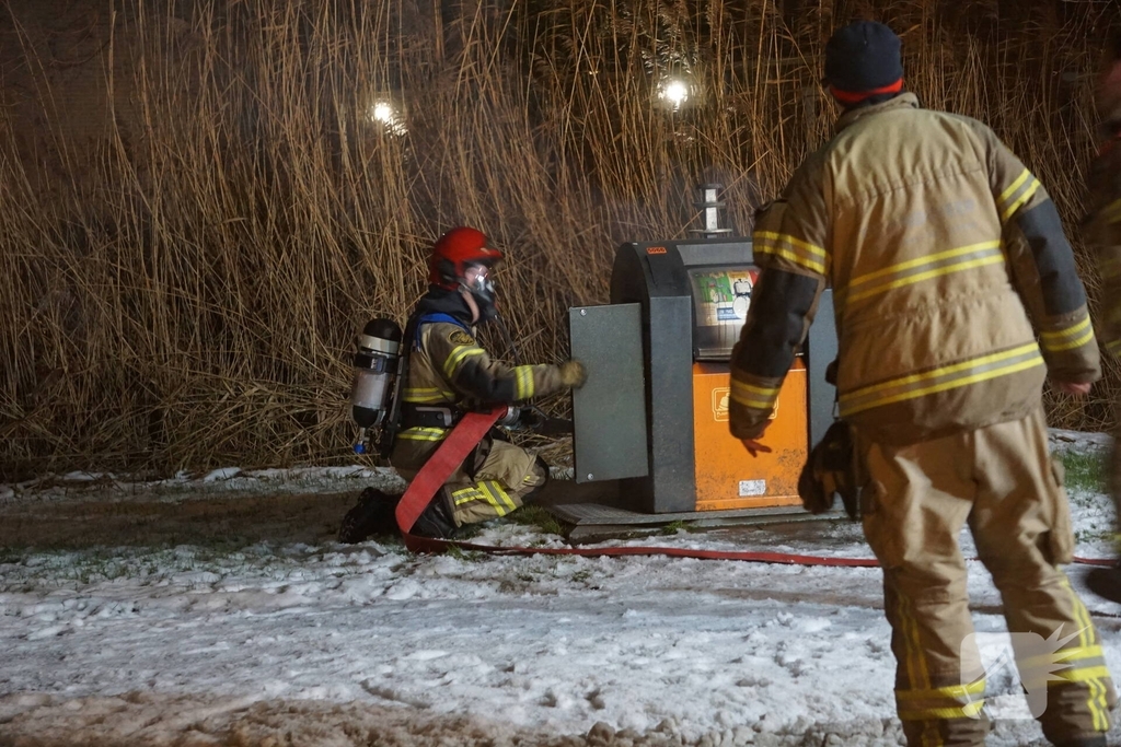 Rookontwikkeling bij brand in afvalcontainer