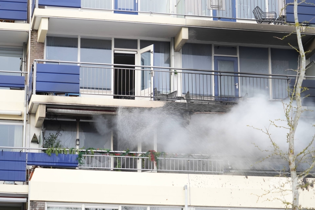 Uitslaande flatbrand, flatgebouw geëvacueerd