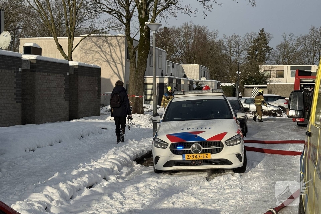 Zwaargewonde bij woningbrand