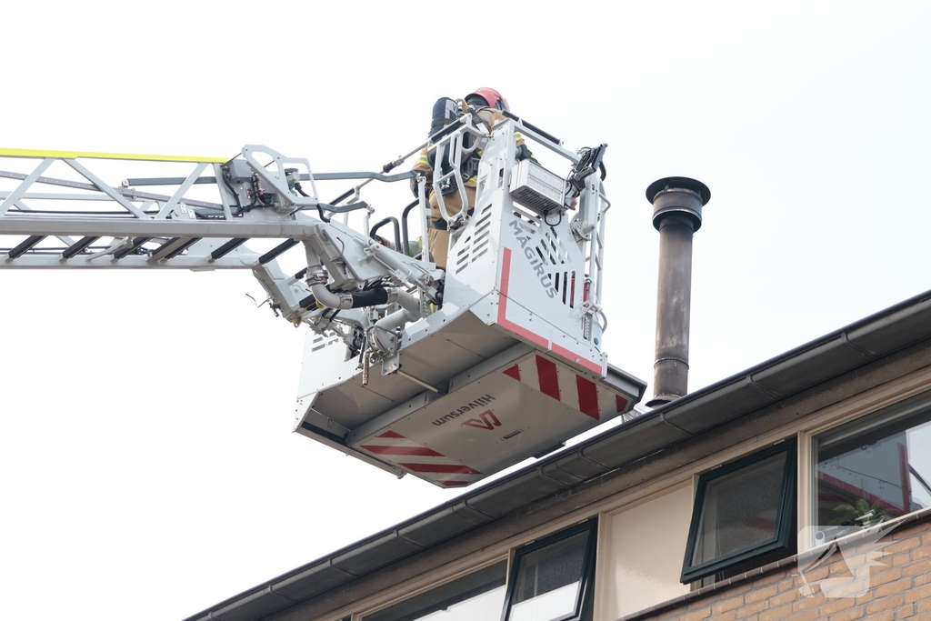 Schoorsteenbrand leidt tot spoedactie brandweer